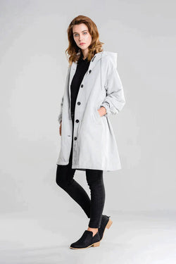 Stylish Women's Waterproof Hooded Jacket with Button Closure - Functional Rainwear for All Weather